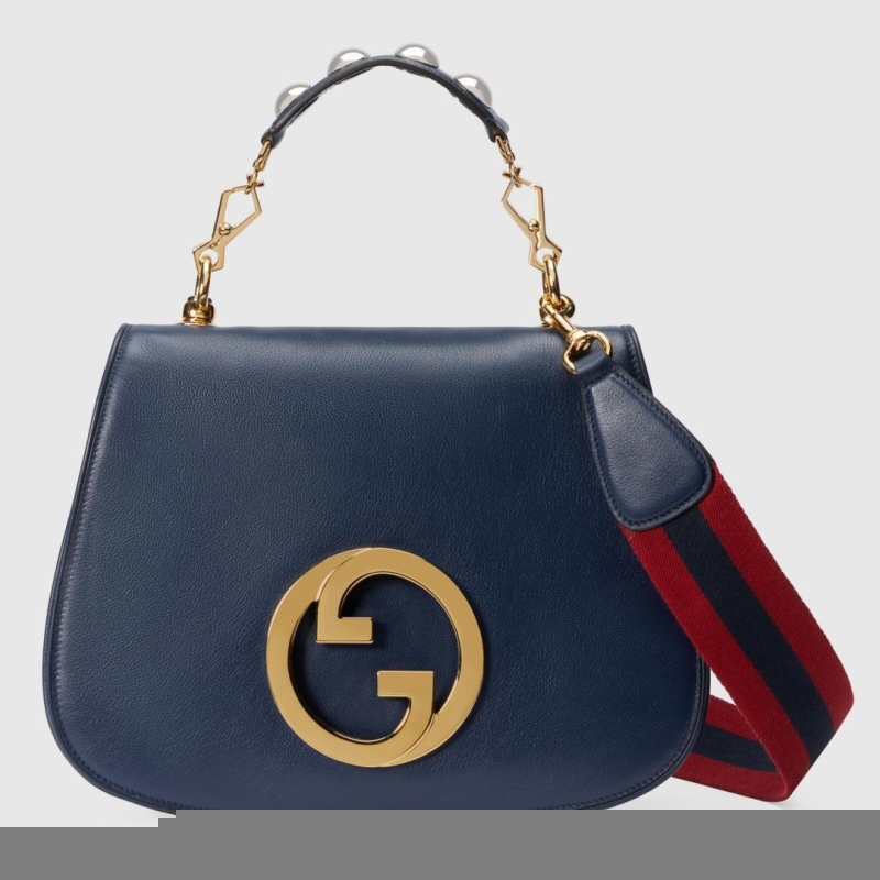G*u*i top handle bags